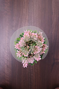 Colorful flowers bouquet on wooden table