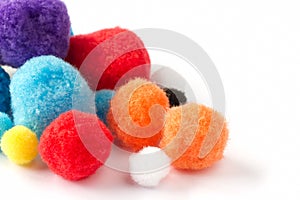 Colorful fluffy pom poms