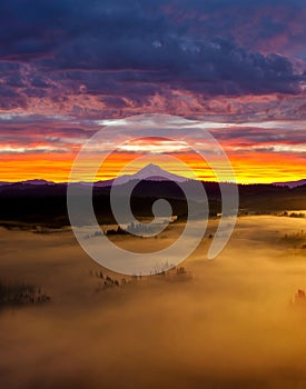 Colorful Foggy Sunrise over Sandy River Valley in Oregon