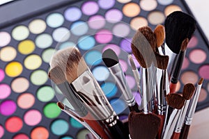Colorful frame with various makeup products