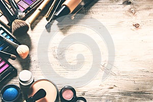 Colorful frame with various makeup products. Beauty background