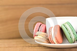 Colorful French Macarons On Wooden background