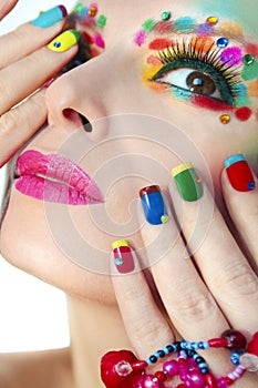 Colorful French manicure and makeup.