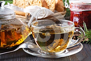 Colorful fresh herbal brewed teas in glass teapots