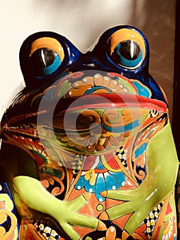 A colorful frog sits on a table in Merida, Mexico - MERIDA - THE YUCATAN photo