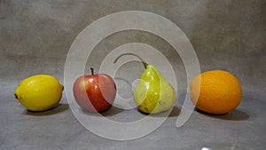 Colorful fruits on a gray background