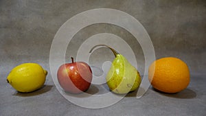 Colorful fruits on a gray background