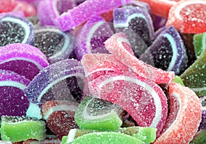 Colorful fruity soft candies as background