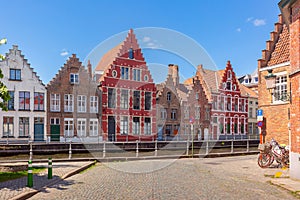 Colorful fun houses on the Bruges canal, Belgium