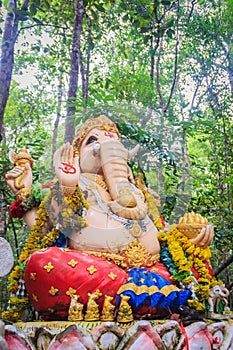 Colorful Ganesha statue in the public forest temple. Ganesha is also known as Ganapati, Vinayaka, Pillaiyar and Binayak, is one of