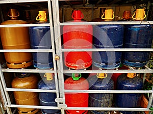 Colorful gas bottles in a row.