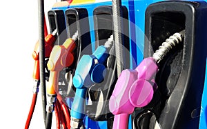 Colorful gas pump nozzle on white background