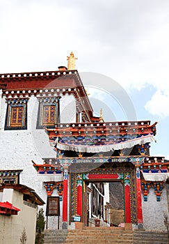 Colorful gate in Songzanlin Monastery in Zhongdian (Shangri-La), Yunnan, China