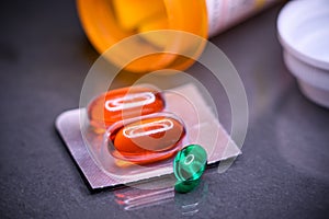 Colorful gel capsules dispensed with packaging