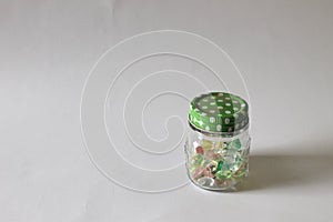 Colorful gems toy in closed transparant jar