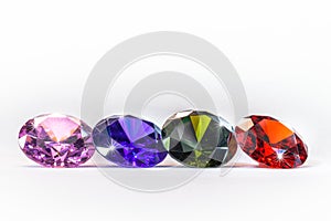 colorful gems on white background photo