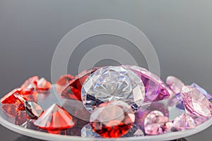 colorful gems on white background photo