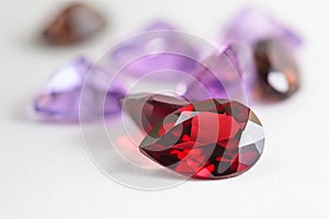 Colorful gemstones with garnet stone