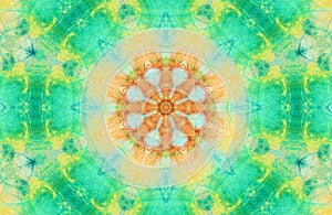 Colorful geometric kaleidoscopic texture in yellow and turquoise colors . Psychedelic tribal composition