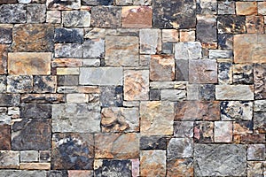 Colorful Geometric Stone Wall.