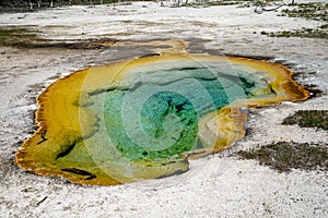 Colorful geyser hot spring in Biscuit Basin in Yellowstone National Park