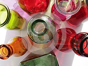 colorful glass bottles and reflections