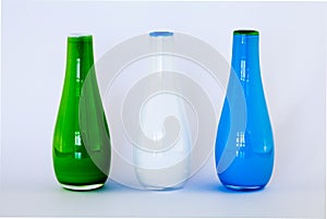 Colorful glassbottles on white background