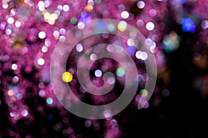 Colorful glitter abstract background with bokeh