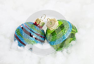 Colorful glitter Christmas balls over white background