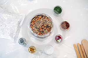 Colorful Glitter and Craft Supplies on Table