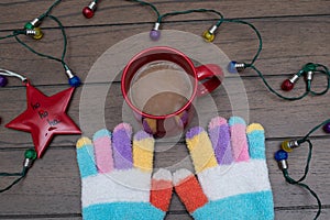 Colorful gloves and christmas lights