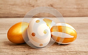 Colorful golden bright handmade painted easter eggs