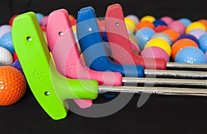 Colorful Golf Balls and Putters