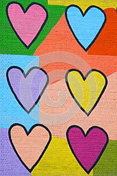 Colorful graffiti spray painted funny hearts