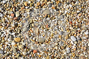 Colorful gravel backgraund, top view, summer vibe