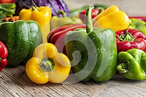 Colorful green , red and yellow peppers paprika background