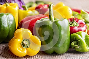 Colorful green , red and yellow peppers paprika background