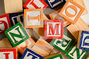 A colorful group of children's, wooden letter blocks