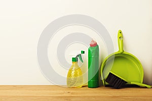 Colorful group of green cleaning supplies