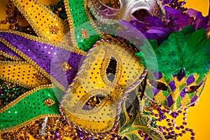 Colorful group of Mardi Gras or venetian mask or costumes on a y