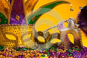 Colorful group of Mardi Gras or venetian mask or costumes on a y