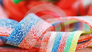 Colorful gummy candy rotating sweets background