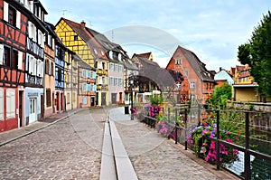 Colorful half timbered houses along a canal, Colmar, France