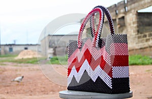 Colorful hand bag made of beads. Beaded bag for ladies.