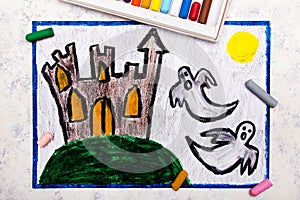 Colorful hand drawing: Old scary castle and two ghosts at night.