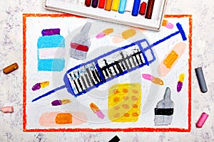 Colorful hand drawing: syringe and pills.