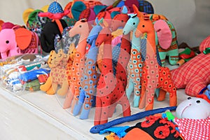 Colorful hand made toys made up of cloths