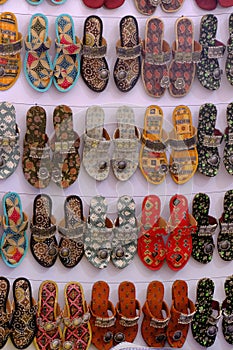 Colorful Handmade chappals (sandals) being sold in an Indian market, Handmade leather slippers, Traditional footwear