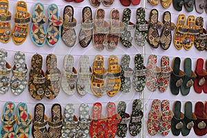 Colorful Handmade chappals (sandals) being sold in an Indian market, Handmade leather slippers, Traditional footwear