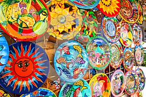 Colorful handmade decorative mexican plates with many patterns o